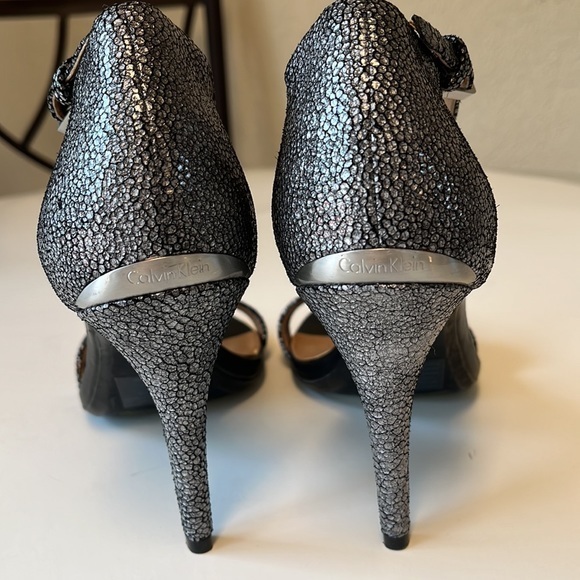 Calvin Klein high heel shoes. Silver in color. 3 1/2 inches high. Size 7‎ 1/2. - Picture 4 of 6